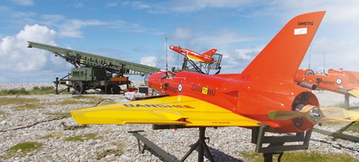 Banshee Whirlwind with a launcher in the background