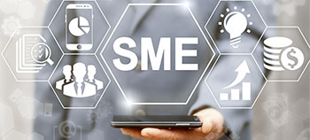 Bringing to life the value of SMEs card - image of man in suit holding mobile phone with SME above - card