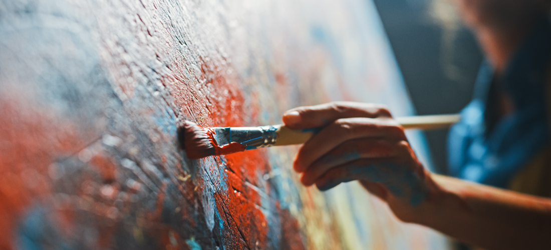 Artist painting on canvas - CES blog 2023