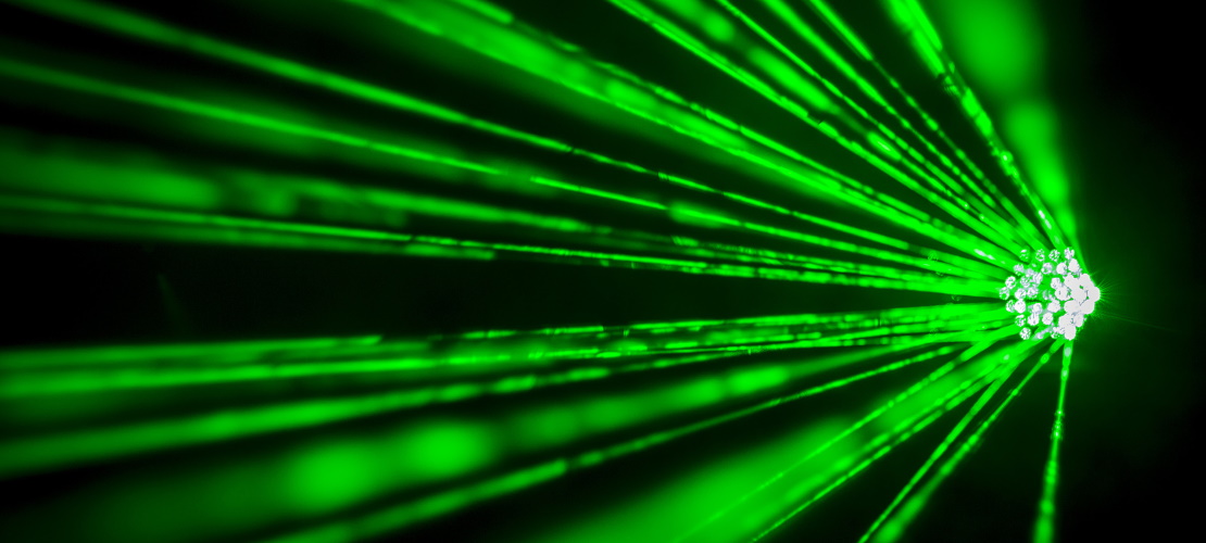Laser Vibrometry - image showing green laser beams against black background
