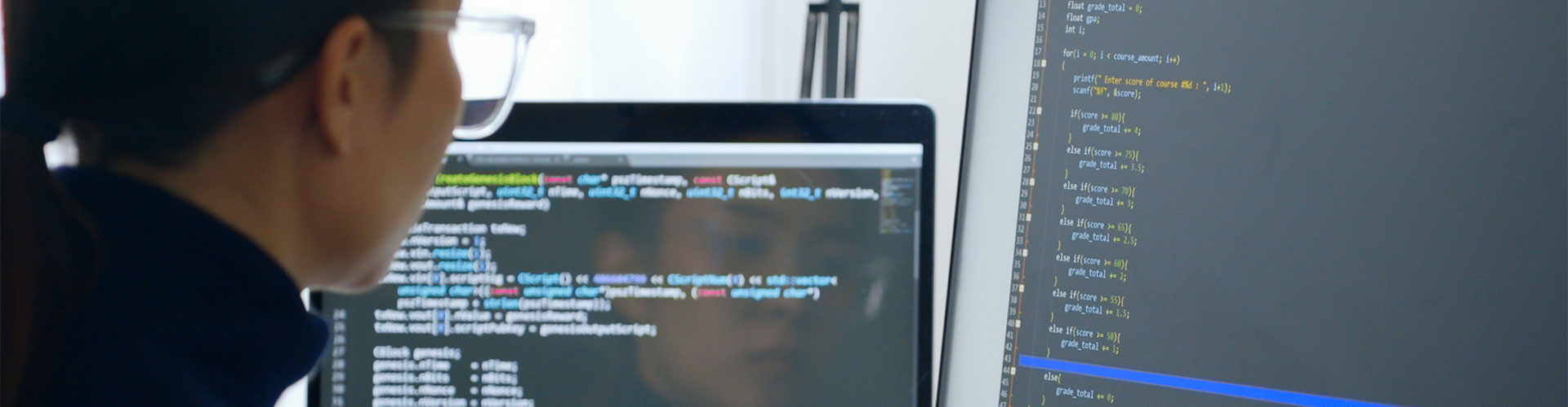 Woman sitting at computer screen