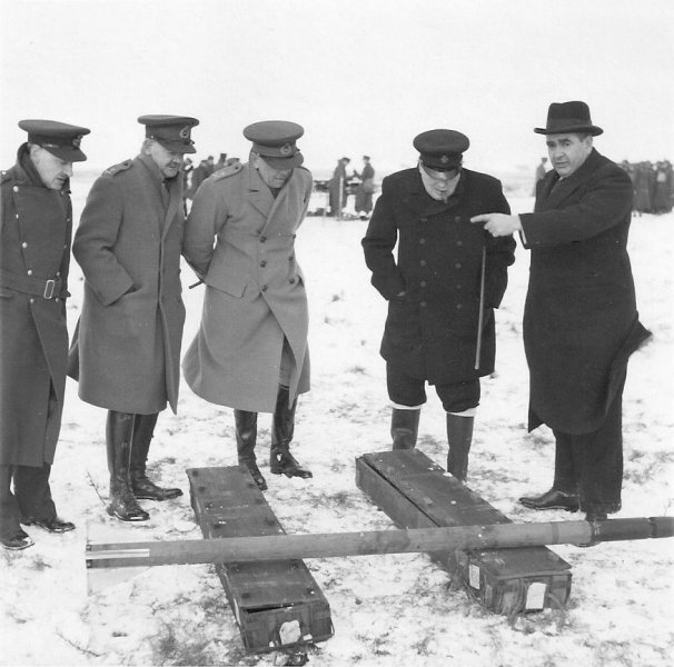 3 January 1941. The PM witnessed a trial of 3in AA 'Unrotated Projectiles' (UPs or 'Z' Rockets). The Battery was commanded by son-in-law, Major Duncan Sandys. With Churchill is Dr Alwyn Crowe, 'father' of the project (IWM)